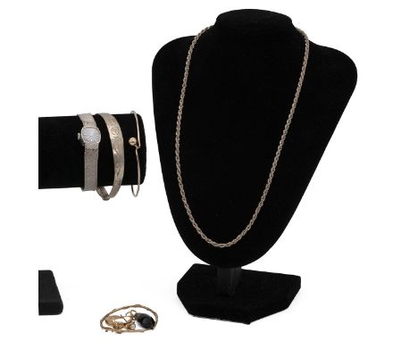 A collection of miscellaneous jewellery including various 9ct gold items, 3.8 grams, silver necklace bangle and other items.