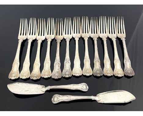 A matched part-set of King's pattern silver flatware, primarily George IV and later, some with crest and motto above, compris