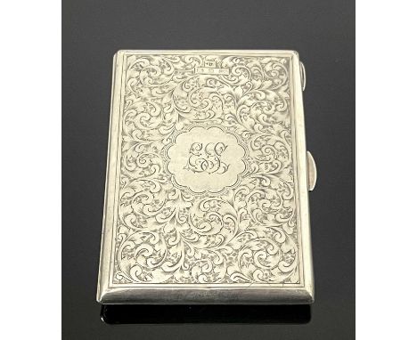 A Victorian silver card case, rectangular form, the exterior with foliate scroll decoration and central engraved cartouche, '