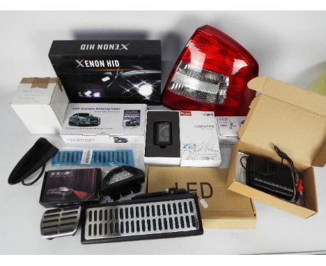 Automotive Parts - Lot to include high intensity discharge lamps, Octavia rear light cluster, dash cam, HUD and similar. [2]