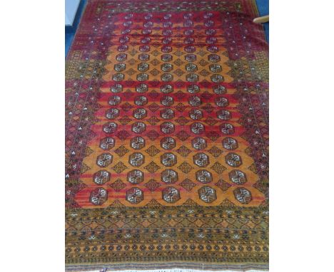 An Afghan carpet, 300cm by 215cm