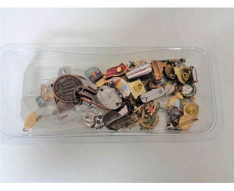 A quantity of pin badges, enamel badges etc 
