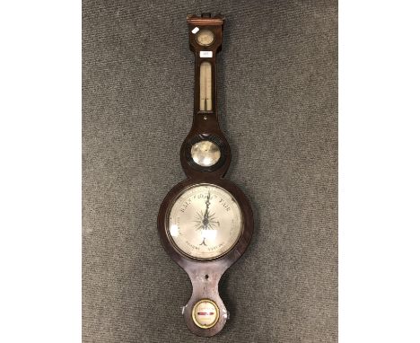 A Nineteenth Century barometer in inlaid mahogany case. 