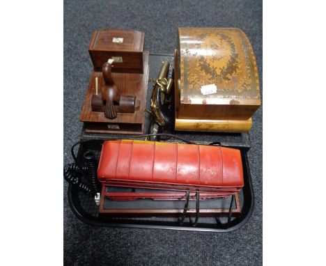 A tray of ornamental pistols, Eastern trinket box and cigarette box, cased spoons, novelty telephone etc 