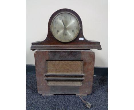 A walnut cased HMV radio together with an oak mantel clock with silvered dial 