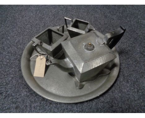A three piece Sheffield pewter Art Deco tea service on tray 