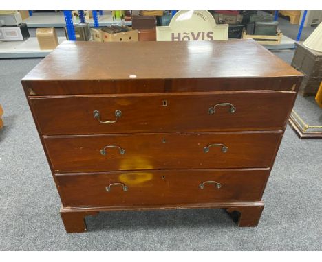 A Victorian mahogany three drawer chest on bracket feet 