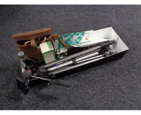 A box of Marinox 12 x 40 binoculars, camera tripod, student microscope, diver's knife, wrist watches, Nissan parts booklets  
