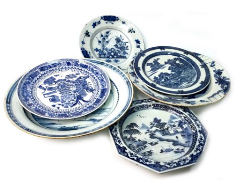 COLLECTION OF CHINESE AND OTHER BLUE AND WHITE PLATES, with various floral and architectural designs, the largest 41cm diamet