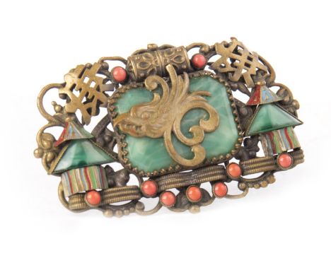 LATE 19TH CENTURY CHINESE BROOCH, modelled with Chinese characters and a phoenix head flanked with pavilions, in simulated ja