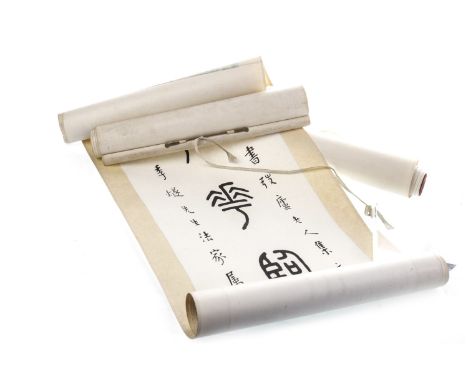 PAIR OF CHINESE CALLIGRAPHIC SCROLLS, 132cm x 27.5cm overall, along with another scroll with caligraphy subject, 142cm x 40cm
