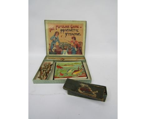 A vintage magnetic fishing game and set of dominoes 