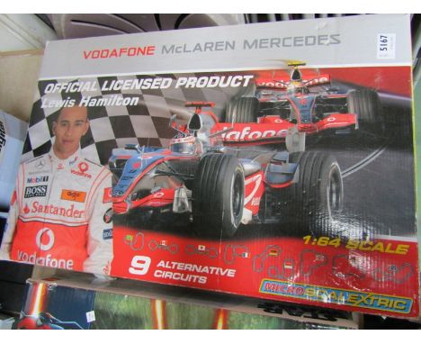 A Vodafone McClaren Mercedes Scalextric set 