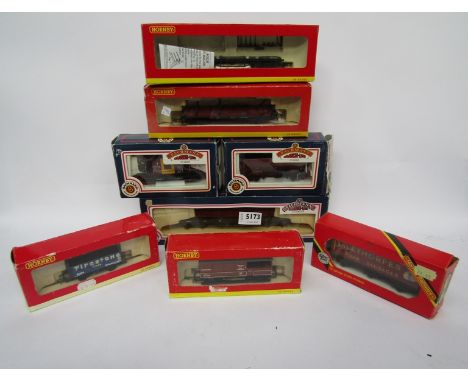 Eight items of boxed 00 guage rolling stock including Bachmann and Hornby 