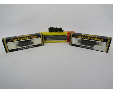 A collection of N gauge locomotives including boxed Graham Farish by Bachmann 1104 GWR 9400 Pannier Tank and 1005 BR Green 08
