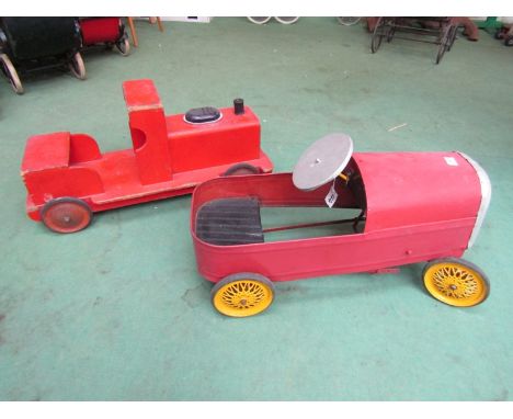 A vintage metal pedal car and a painted wooden locomotive (2) 