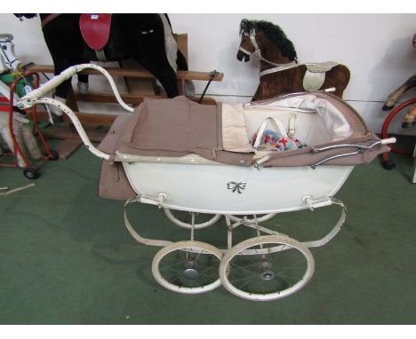 A vintage Silver Cross dolls pram 