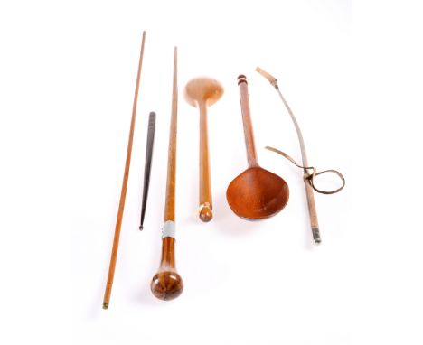 TWO TREEN LADLES, together with A VINTAGE YARDSTICK, CROP, A DRUMSTICK&nbsp;and A CANE, with spliced knob handle. (6)