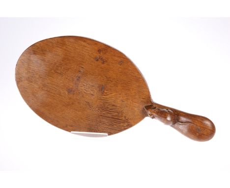 ROBERT THOMPSON OF KILBURNA MOUSEMAN OAK CHEESEBOARD, the oval board with slight adzing, carved mouse signature to the handle