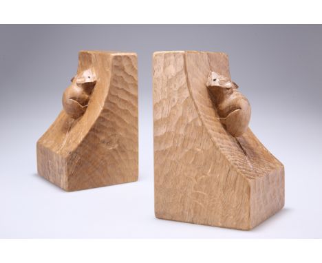 ROBERT THOMPSON OF KILBURNA PAIR OF MOUSEMAN OAK BOOKENDS, of characteristic form, adzed, carved mouse signatures.15.5cm high