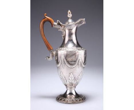 A GEORGE III SILVER EWER, by Daniel Holy & Co, Sheffield 1780, in the Neo-Classical style, with an acorn finial, the body dec