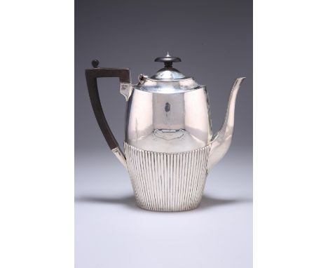 A VICTORIAN SILVER COFFEE POT, by James Dixon &amp; Sons, Sheffield 1893, oval form with half fluted body, angular wooden han