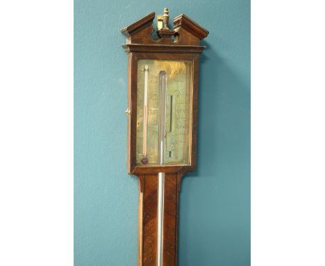 A GEORGE III MAHOGANY STICK BAROMETER, SIGNED GOBBO, YORK, with brass dial and broken-arch pediment with brass finial. 98cm