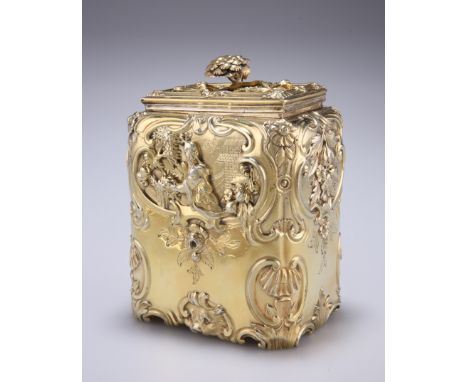 A GEORGE III SILVER GILT TEA CADDY, by Thomas Heming, London 1770, after Paul de Lamerie, rectangular form, heavily embossed 