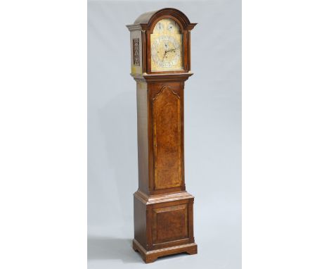 A MAPPIN &amp; WEBB WALNUT THREE-TRAIN LONGCASE CLOCK, the thirteen inch break arch dial with switches for chime/silent Westm