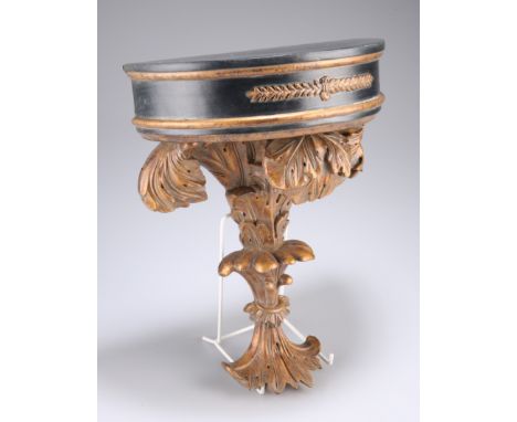 A PERIOD STYLE PARCEL-GILT WALL BRACKET.&nbsp;25cm wide