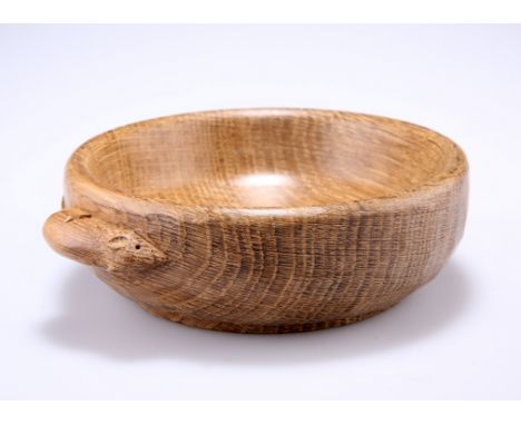 ROBERT THOMPSON OF KILBURNA MOUSEMAN OAK NUT DISH, circular, adzed exterior, carved mouse signature. 14cm diameter