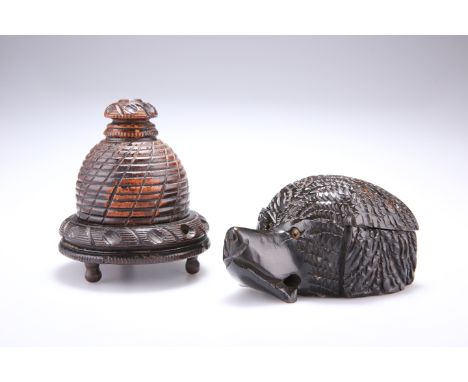 TREEN: A 19TH CENTURY CARVED INKWELL, in the form of a dog's head, 10.9cm back to front; together with A 19TH CENTURY LIGNUM 