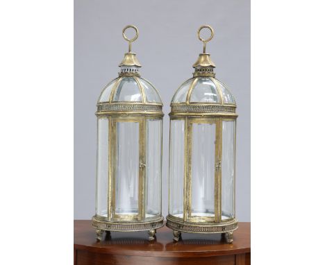 A PAIR OF PERIOD STYLE GILT METAL HANGING LANTERNS, each with domed top and hinged door. 78cm high