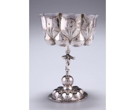 A GERMAN SILVER CUP, by Berthold Muller &amp; Son, import mark for Chester,&nbsp;the heavily lobed bowl lightly planished wit