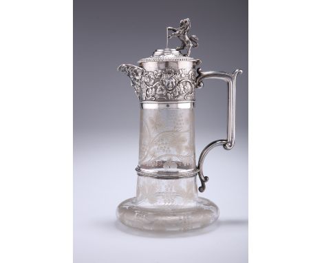 A VICTORIAN SILVER-MOUNTED CLARET JUG,&nbsp;by&nbsp;Frederick Elkington, Birmingham 1879, the glass body etched with fruiting