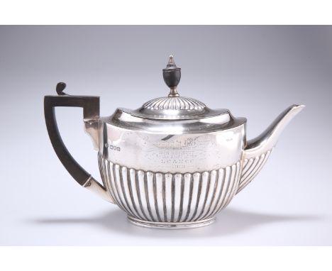 SPORTING INTEREST: AN EDWARDIAN SILVER TEAPOT,&nbsp;William Hutton &amp; Sons Ltd, London 1909, oval, partially reeded body w