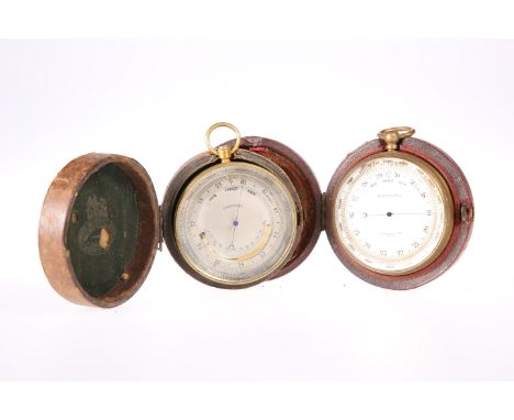 ~ A NEGRETTI &amp; ZAMBRA 2 3/4-INCH BRASS BODIED TRAVELLING BAROMETER WITH THERMOMETER 'COMPENSATED', the reverse with monog
