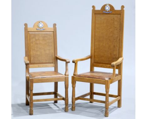 MALCOLM PIPESA PAIR OF FOXMAN OAK CEREMONIAL ARMCHAIRS, made to commemorate a Royal visit in the 1970's to the Police College