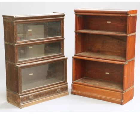 TWO GLOBE WERNICKE BOOKCASES, the first oak, with three glazed sections and base drawer, the second mahogany, of three sectio