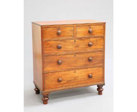 A MAHOGANY CHEST OF DRAWERS, first half of 19th century, the rectangular top with reeded moulding, with two short over three 