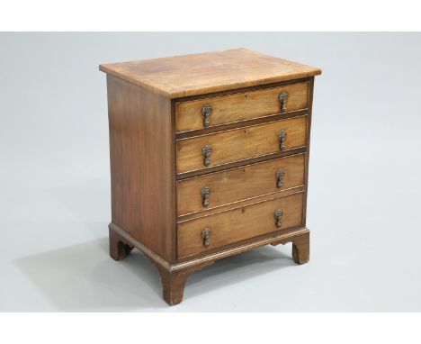 A GEORGE III MAHOGANY CHEST OF DRAWERS, of small proportions, the crossbanded rectangular top over four cockbeaded long gradu