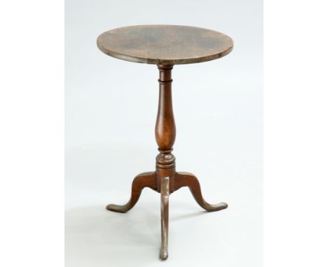 A SMALL GEORGE III OAK TRIPOD TABLE, 18TH CENTURY, the circular top raised on a baluster stem continuing to hipped downswept 