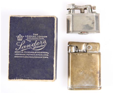 A RARE LADY'S CIGARETTE LIGHTER BY DUNHILL,&nbsp;the silver-plated body incorporating a shrouded guard and friction wheel, Re