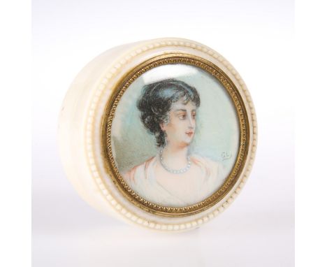 A 19TH CENTURY IVORY TRINKET BOX, circular, the cover inset with a portrait miniature of a lady, initialled GL, within a gilt