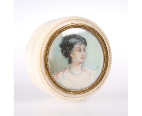 A 19TH CENTURY IVORY TRINKET BOX, circular, the cover inset with a portrait miniature of a lady, initialled GL, within a gilt