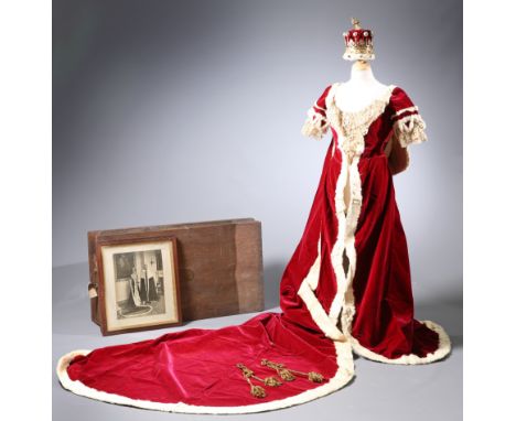 ~ THE CORONATION ROBES OF THE COUNTESS OF GUILFORDby Ede, Son & Ravenscroft, crimson velvet trimmed with fur; together with T