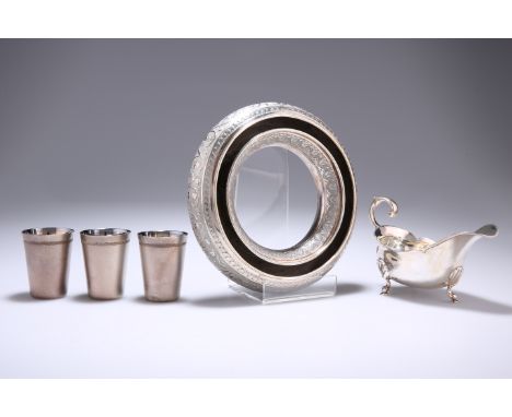 A LATE VICTORIAN SILVER SAUCE BOAT, by George Lambert, London 1892, with shell-capped legs, 2.9 troy ounces; together with A 