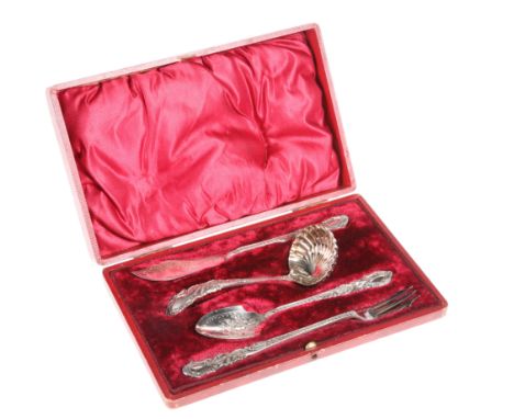 A LATE VICTORIAN SILVER-PLATED SERVING SET, including sifting ladle, pickle fork and butter knife, in a fitted case.