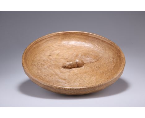 ROBERT THOMPSON OF KILBURNA MOUSEMAN OAK FRUIT BOWL, circular, adzed inside and out, carved mouse signature. 29cm diameterThe