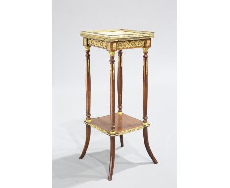 A FRENCH GILT METAL MOUNTED AND ONYX TOPPED JARDINIERE STAND, the square top with pierced brass gallery above a frieze applie